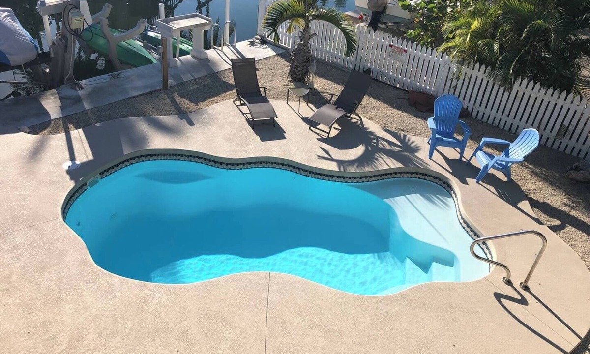 Little Torch Key House | 5 Pirate's - Pool & seawall for boat. This is a pet friendly home. A pet fee and approval of your pet is required.