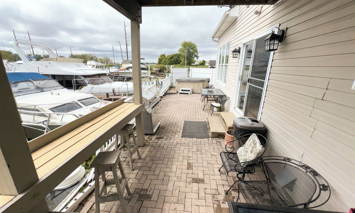 Anchor Bay Harbor Boat Rental | 50ft Stationary House Boat with Upper Sun Deck