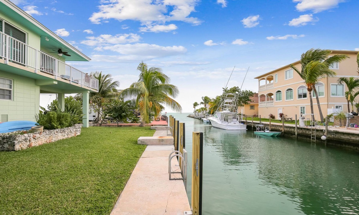 Marathon House | Amazing Waterfront Gem W/ Boat Dock, Wraparound Balcony & Full Kitchen