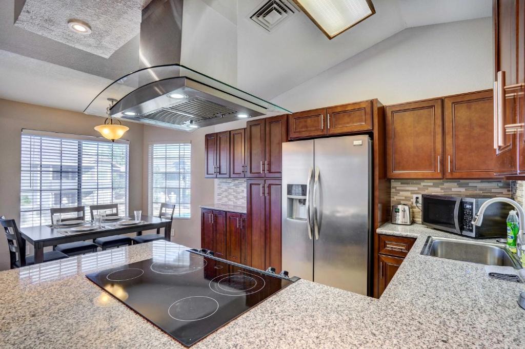 Chandler House | Balcony & Pool Access: Quiet West Chandler Condo