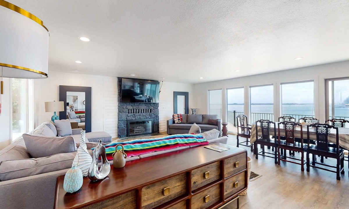 Bay City House | Bayview home with a deck overlooking the locally famous Ghost Hole fishing spot