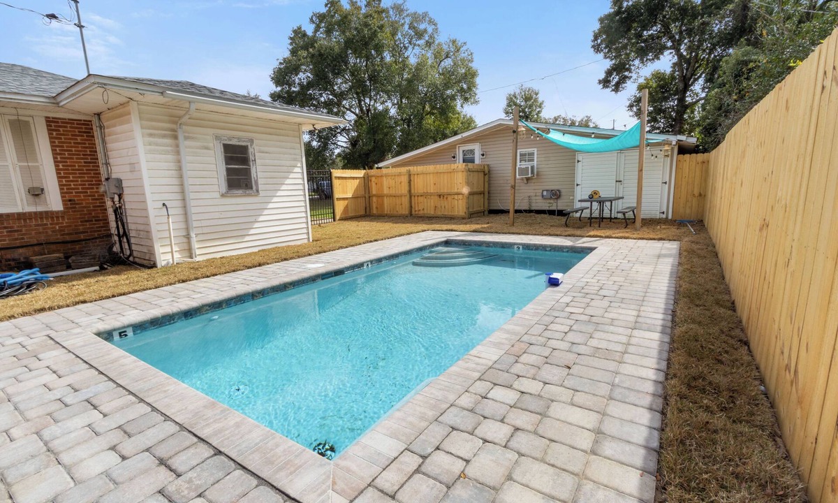 East Pensacola Heights House | Beautiful heated pool(shared), games, and plenty of space for the entire family!