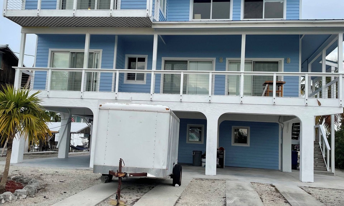 Port Pine Heights House | Big Pine House, 4/2 two story, canal access 75 ft dock and stunning Bay view.