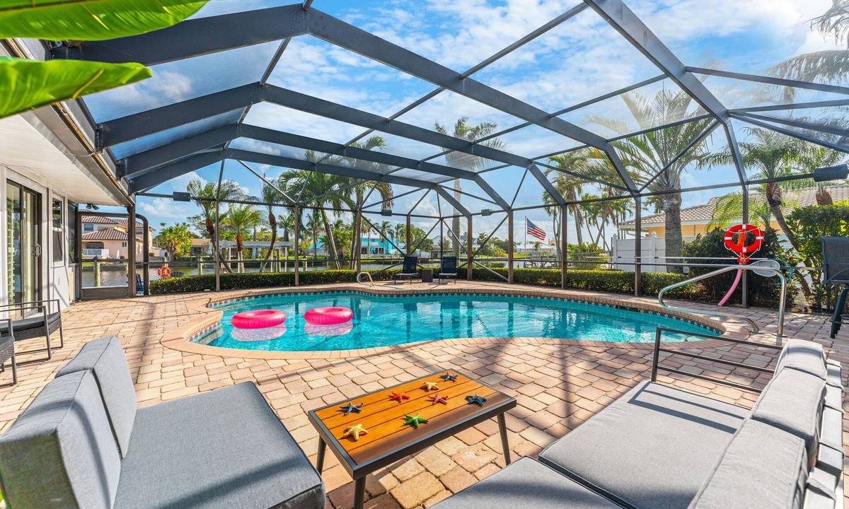 Cocoa Isles House | Canal Access: Boat Lift, Heated Pool & Dock