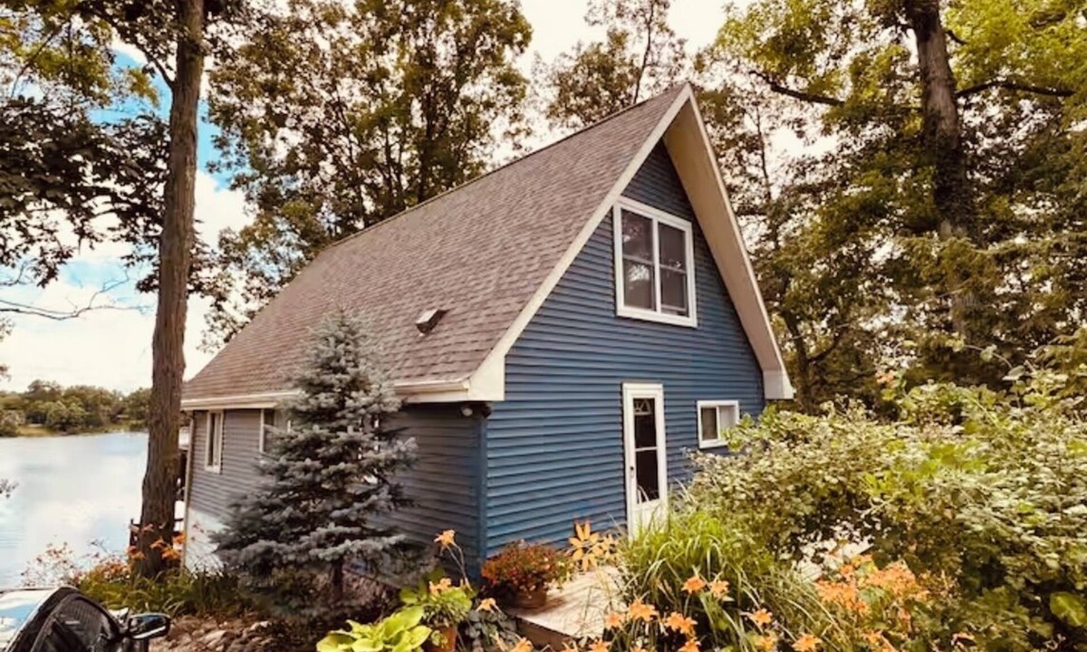 Syracuse Cottage | Charming lakefront cottage,private lake & dock, perfect secluded getaway