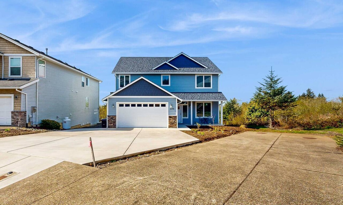 Netarts House | Comfortable home with ocean views with private hot tub deck fireplace WiFi