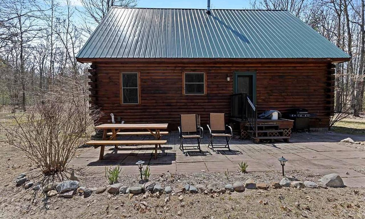 Manistee Cabin | Cozy Forest Cabin with Fireplace Near Lake Michigan Beaches in Manistee, Michigan