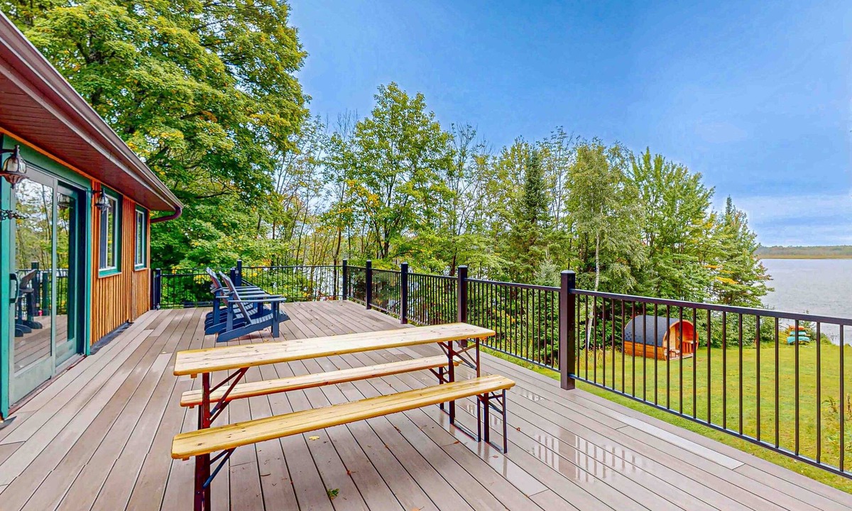 Presque Isle House | Dog-friendly lakefront home with boat access, deck, fireplace, gas grill, kayaks