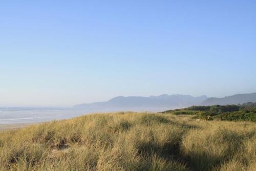 Rockaway Beach House | Downtown pet friendly wood cabin