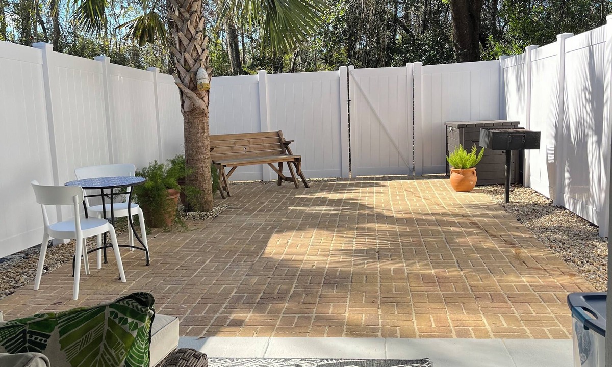 Pensacola Condo | Family Friendly Condo minutes to beach w/large pool and private outdoor space.