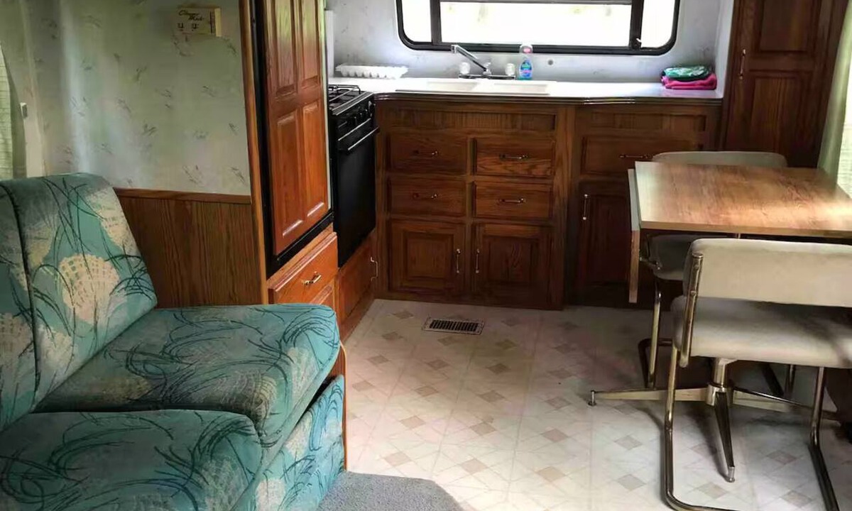 Irons House | Forest campground! 1 BR RV with Bath house