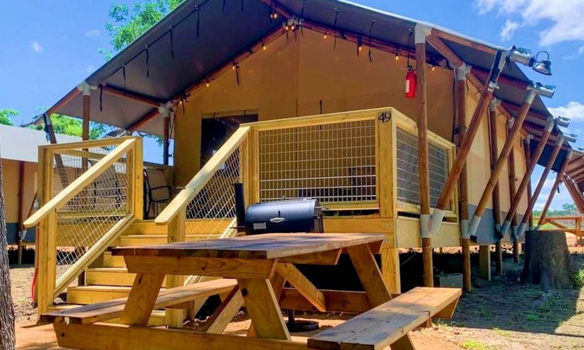 Prairie Lea RV Rental | Fully-Equipped Riverside Glamping Safari Tent on the San Marcos River, Texas