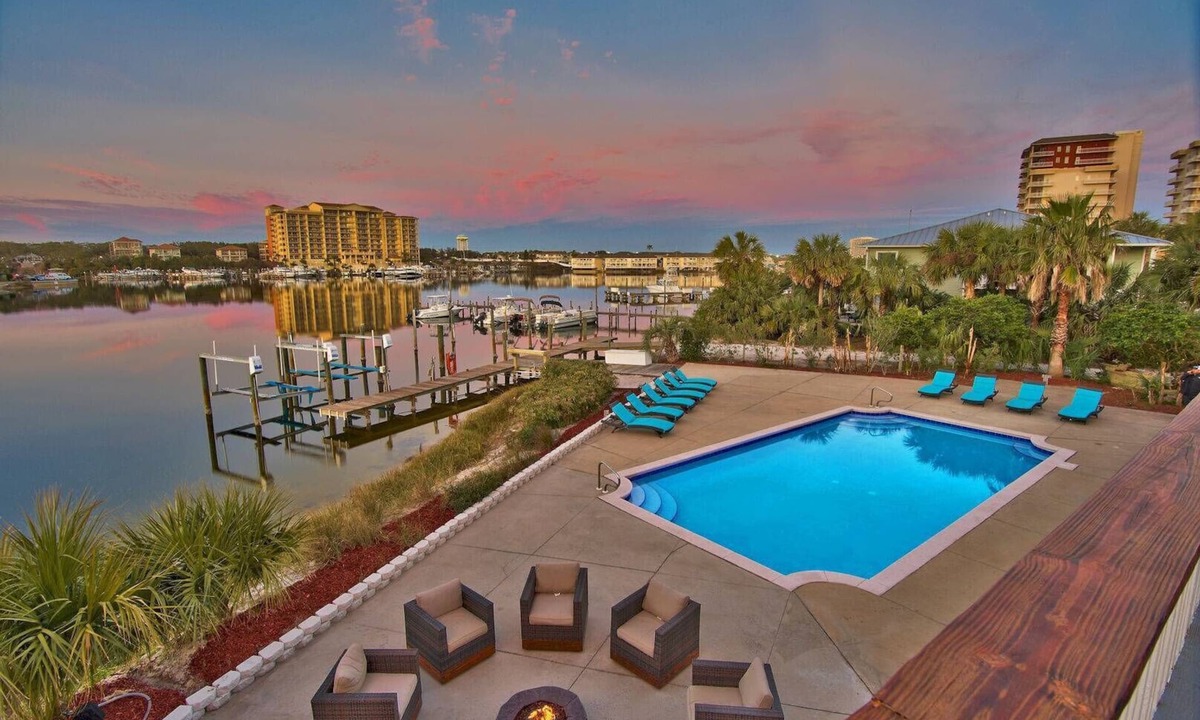 Holiday Isle House | Harborfront Home with Pool, Dock & Tiki Cruise