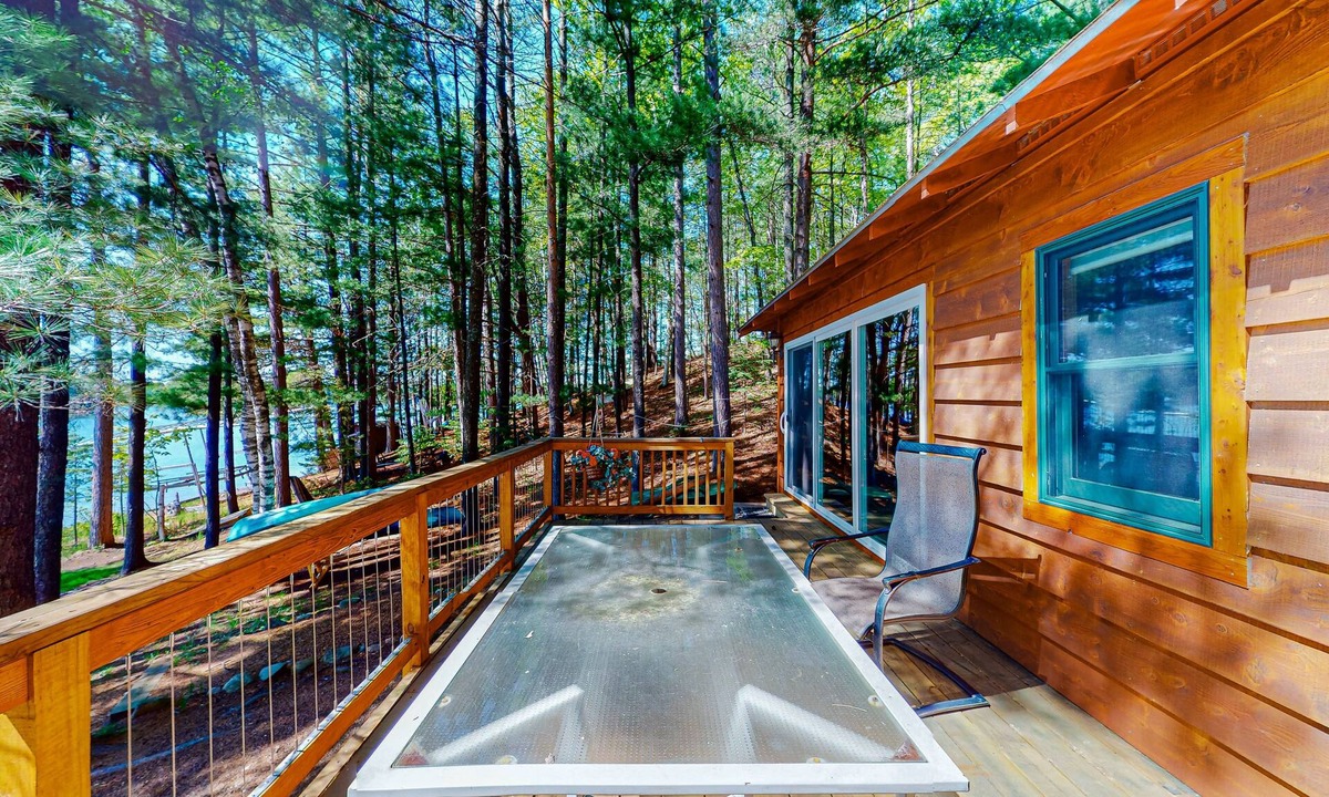 Boulder Junction Cabin | Lakefront cabin with private dock, boat, firepit, fish cleaning house, fireplace