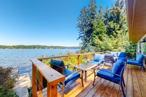 Dunes City House | Lakefront dream with private hot tub dock kayaks pedal boat & amazing views