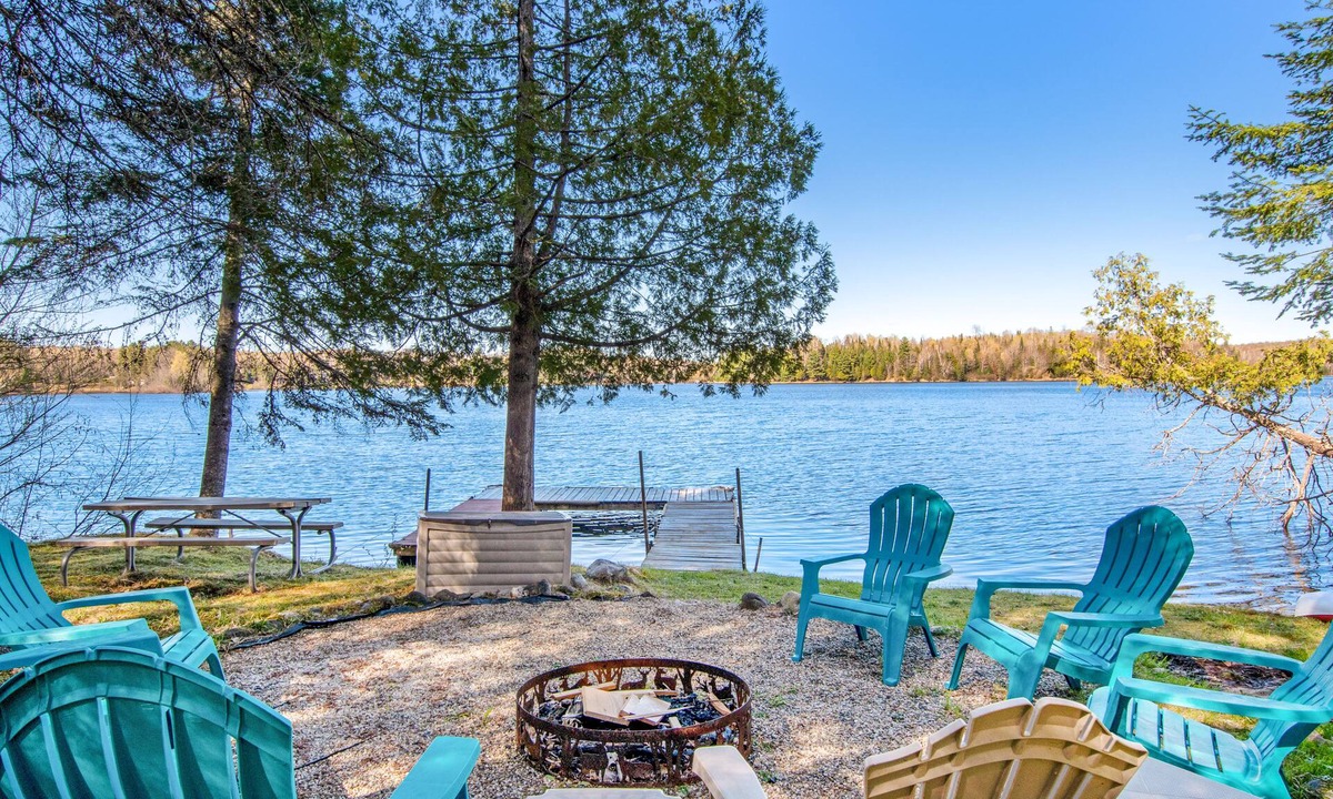 Presque Isle Cabin | Lakefront Getaway W/ Firepit, Free WiFi, Dock, & Large Deck - Dogs Welcome