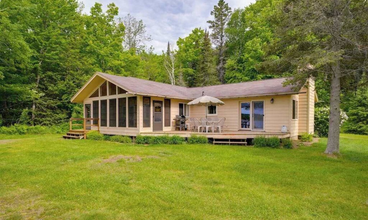Manitowish Waters House | Lakefront haven with three living areas and WiFi