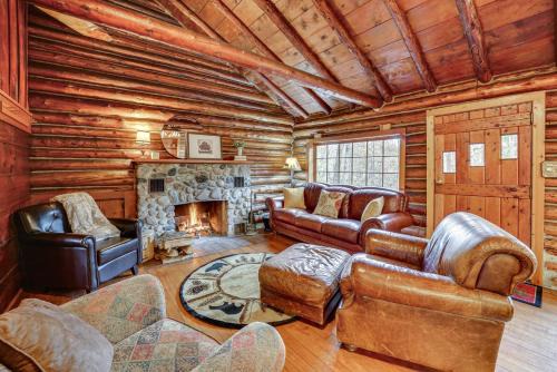 Mason County House | Michigan Log Cabin w/Pere Marquette River Views
