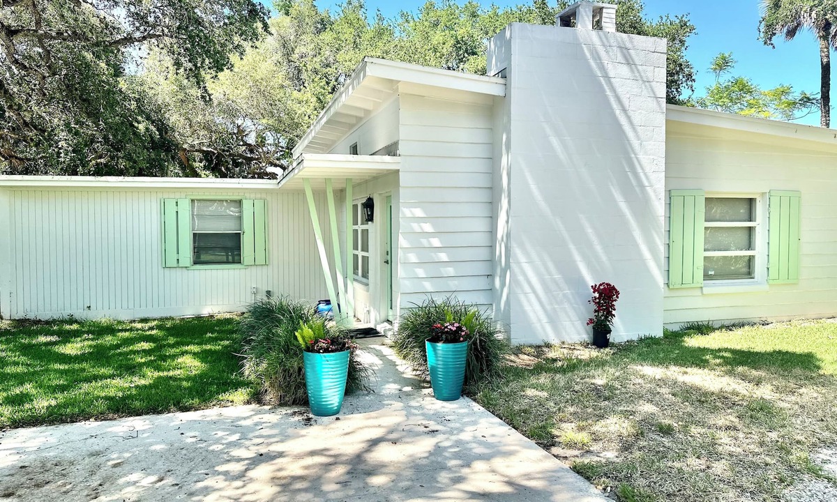 Central Beach House | Mid-Century 2-bedroom, 1-bathroom island home just steps from the beach!