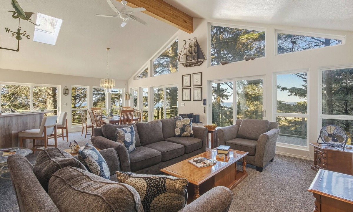 Cape Meares House | Peaceful 4BR Cape Meares Home | Ocean Views, Forest Setting, Wraparound Deck + King Bed