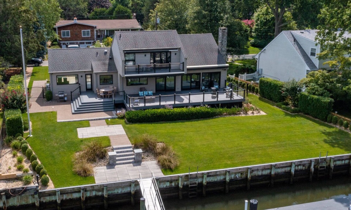 Greenport West House | Pristine waterfront home with direct access to private bay and dock,.
