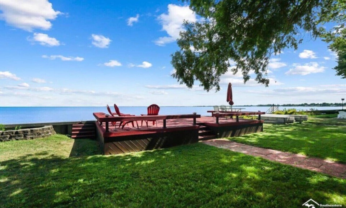 Luna Pier Cabin | Restored historic log cabin and deck on Lake Erie