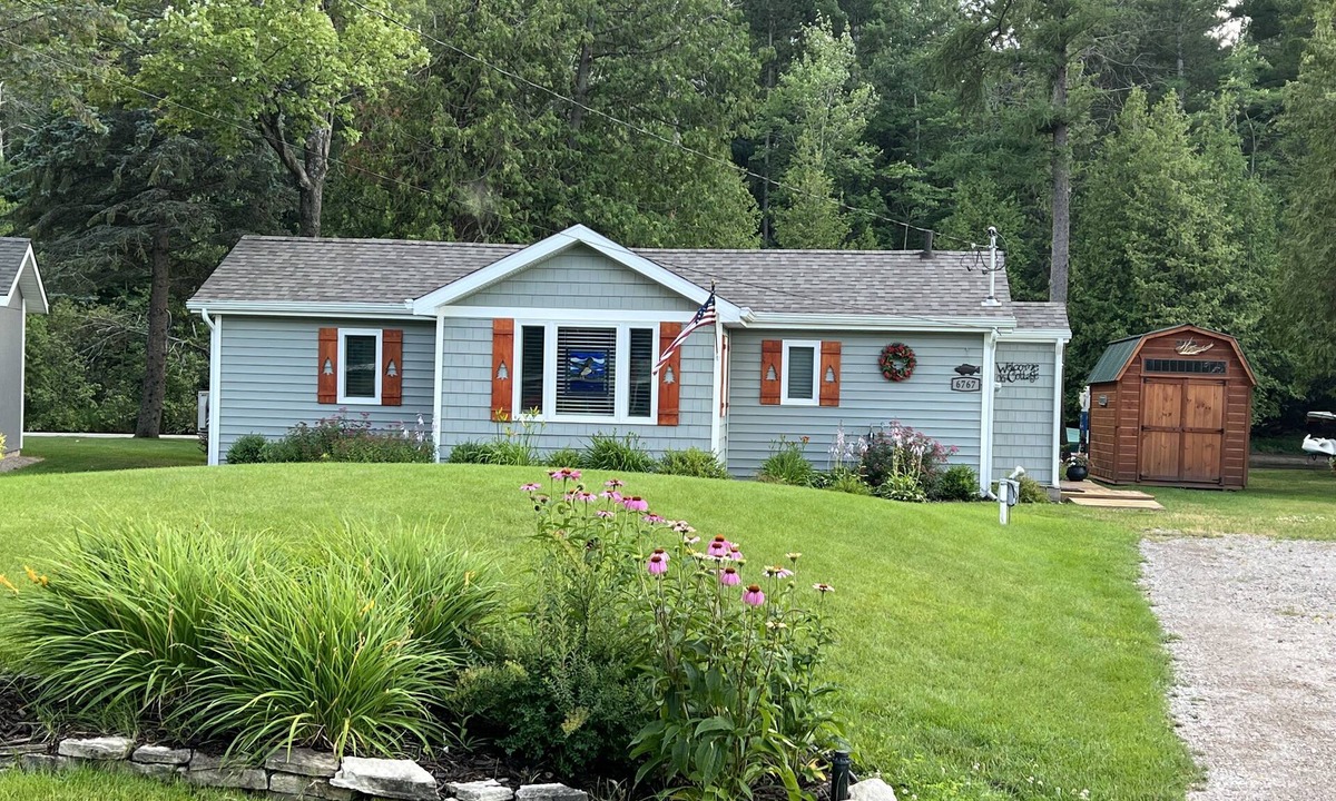 Indian River Cottage | Riverfront Cottage w/Boat Docking and easy access to Burt Lake