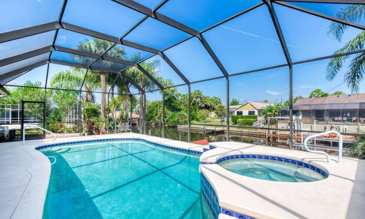 Palm Harbor House | Riverfront, Pool, Dock, Pool Table, River