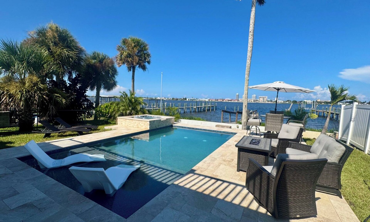 Elizabeth Mcbrides Raulersons House | Riverfront Retreat - Pool & Hot Tub - Mins from Beach, Speedway, & Ocean Center!