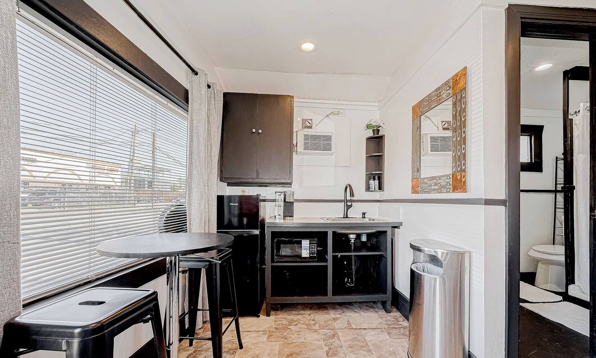 Washington Ave./ Memorial Park Apartment | Tattoo Studio-this converted tattoo studio faces all the Washington Ave action