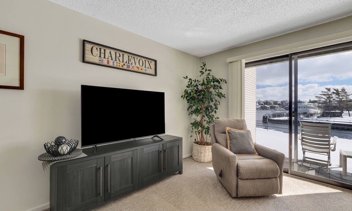Charlevoix Condo | Waterfront Condo #118C at Edgewater Inn | Pool, Hot Tub, Sauna | Sleeps 4