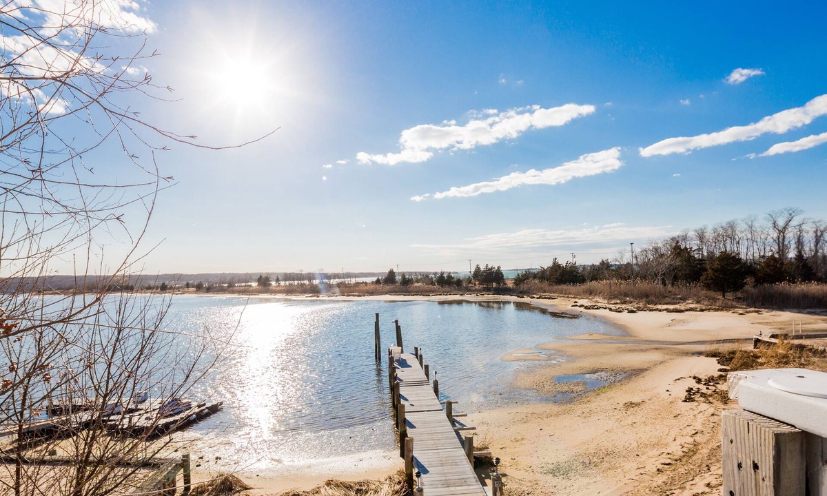 Bay Point House | Waterfront on the Bay! A beautiful 5 bedroom home with dock and walk to Beach.