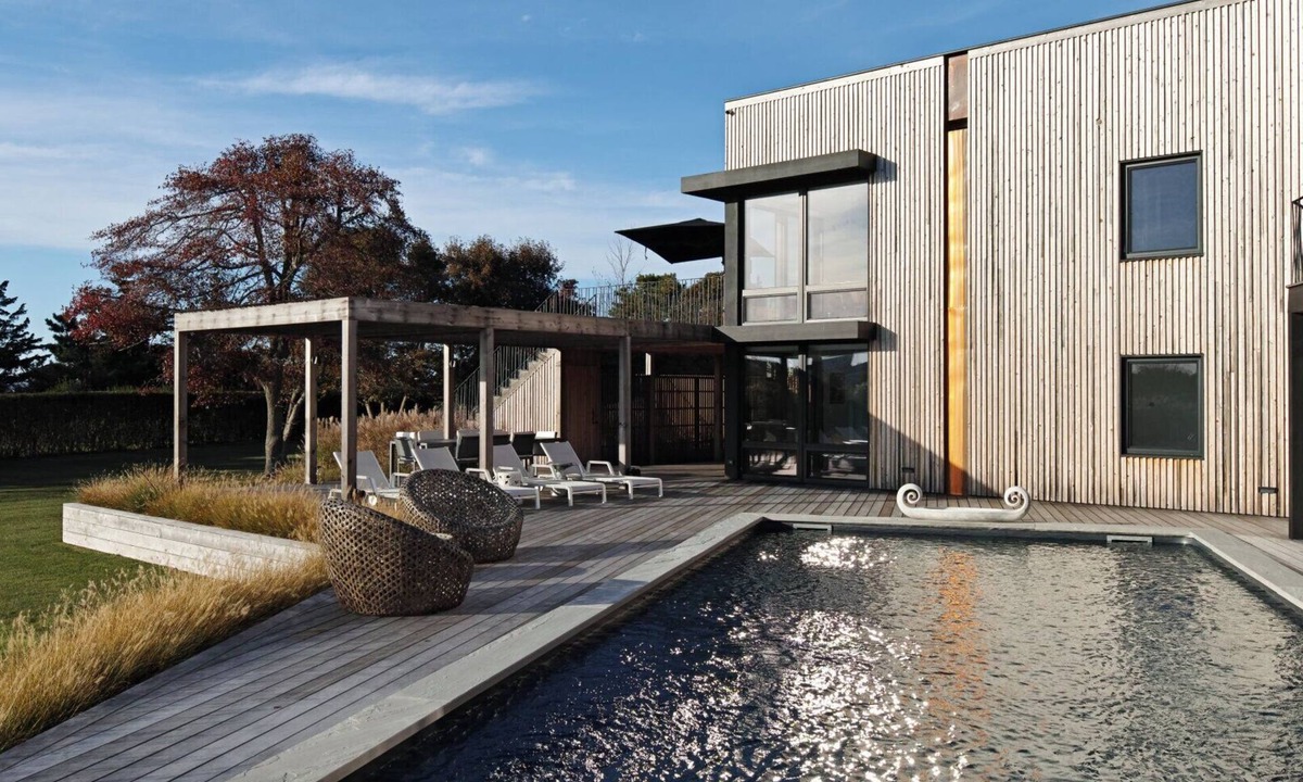 North Sea House | Waterfront Southampton home with dock, pool, gym, great for groups