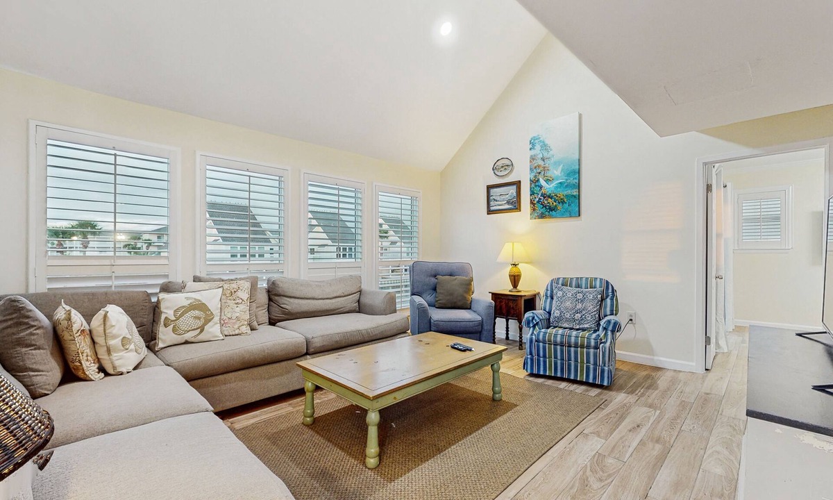 Holiday Isle Villa | Waterfront villa with multi level home, shared pool & easy beach access