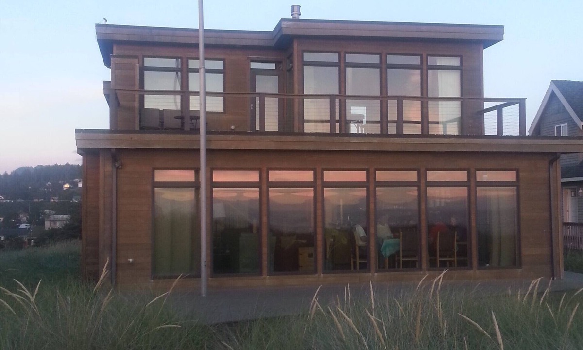 Pacific City House | Welcome to Flotsam! A stunning oceanfront home with iconic Haystack Rock views.