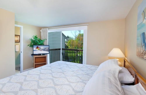 Cedar Condo | 2 King Master Suites, Outside heated pool, Close to Dunes