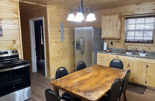 Lejunior Cabin | 2BR 1 Bath cabin w/full kitchen, hot tub, and living room.