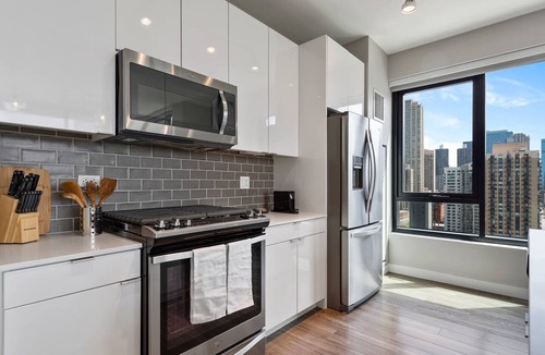 Near North Side Apartment | 2BR Retreat in Downtown + City Skyline Views