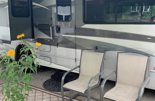 Cedar House | 30' motorhome on private setting.