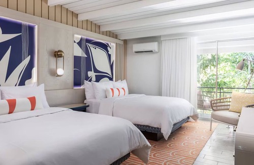 Islamorada Hotel | 4 Guest Room, 2 Queens, Balcony, Free Parking & Pet Friendly