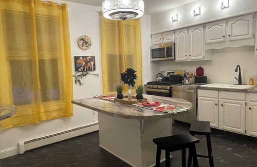 Port Huron Apartment | 5 beds & 1800 sq ft place full of charm & history