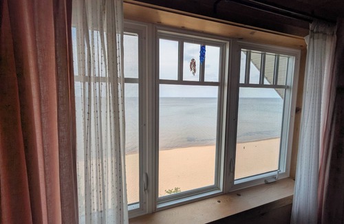 Upper Peninsula Michigan Cottage | A beautiful, tranquil cottage on Lake Superior, just feet from the beach!