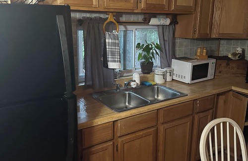 Mio Cabin | A Stream runs through it. Comfy little cabin with a stream by your bedroom.