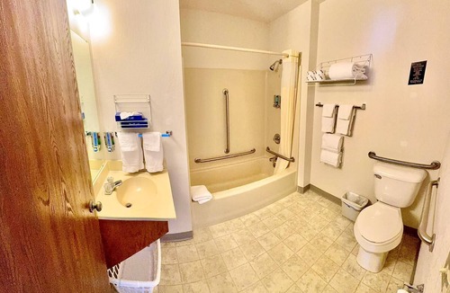 Boulder Junction Apartment | Accessible ADA room with two queen beds, private bathroom, mini fridge, and single-serve coffee maker.