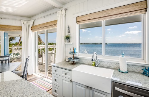 Cutthroat Harbor Estates House | Amazing waterfront home with private beach, dock, pool, WiFi & outdoor kitchen