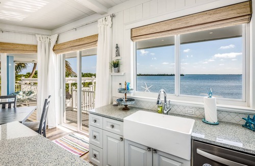Cutthroat Harbor Estates House | Amazing waterfront home with private beach, dock, pool, WiFi & outdoor kitchen