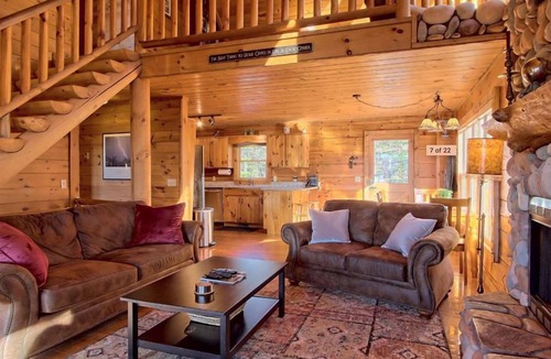 Foxfire Estates Cabin | Appalachian View charms with pet-friendly vibes, big mountain views, a hot tub, pool table, firepit, and WiFi connection