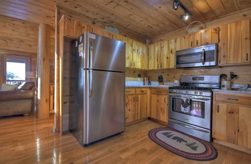 Foxfire Estates Cabin | Appalachian View charms with pet-friendly vibes, big mountain views, a hot tub, pool table, firepit, and WiFi connection