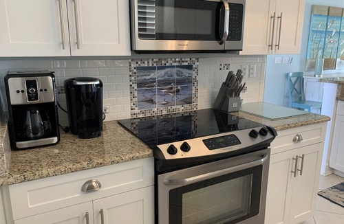 Navarre Beach Condo | August dates available! Beach service through October. Covered parking!