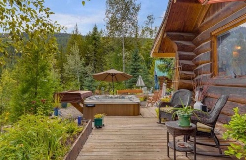 Central Okanagan Cabin | Authentic lofted log cabin with hot tub
